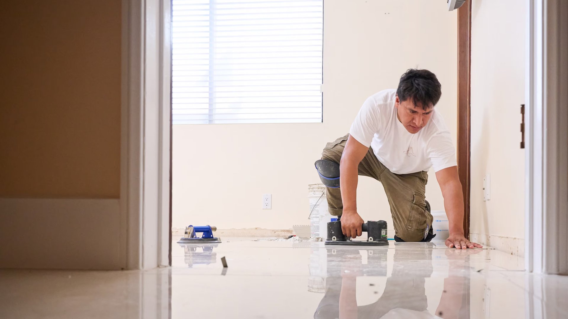 Man finishing floors